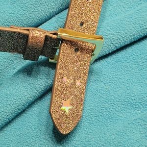 Womans glittery gold belt